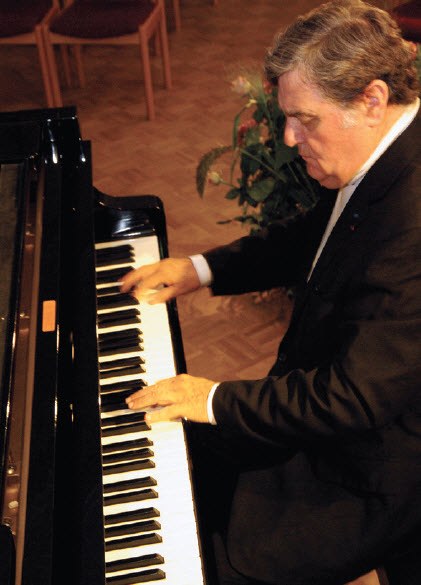 At the piano, in later years